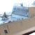 Vergrößern: Rückseite der USS Independence mit Modell-Hubschrauber